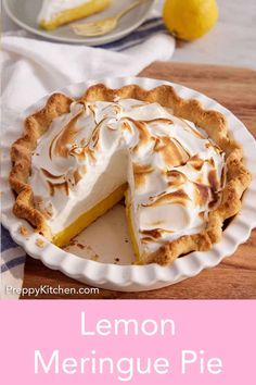 a lemon meringue pie on a wooden table