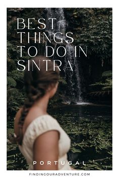 a woman standing in front of a waterfall with the words best things to do in sintra