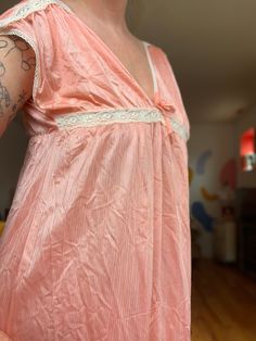 Made in USA  100% Nylon  Size Guide: Tag Size: large  Pit to pit:  14in-18in with elastic  Length: 51 inches  Model is 5'3 and a size medium  Please check description for sizes No  refunds or exchanges. No multiple sizes or colors for items.  Fast and free shipping Pink Lace Nightgown For Summer, Pink Lace Summer Nightgown, Pink V-neck Nightgown With Lace Trim, Spring Pink Lace Nightgown, Pink Lace Nightgown For Sleepovers, Retro Lace Trim Nightgown For Sleep, Vintage Pink V-neck Nightgown, Women's Nightgowns, Nightgowns