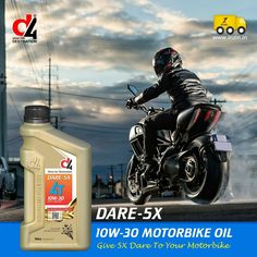 a man riding on the back of a motorcycle next to a bottle of motorbike oil