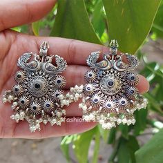 A pair of Trishul Oxidised Earrings – Blue. Size & Other Details Earrings Size: 6cm*4cm Earrings Weight: 11gm/pc Material: Brass, Stone Attire: Lehenga, Salwar Suit, Kurti, Saree, Flared Dress, Gown Blue Oxidized Finish Earrings, Suit Kurti, Oxidised Earrings, Oxidized Silver Earrings, Valentine Gift For Wife, Chandbali Earrings, Bollywood Style, Flared Dress, Indian Bollywood