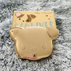 Too Faced Highlighter, Brand New In Package! Clover Collection Glowver Highlighter Champagne Gold Ultra Creamy Powder Palette Is Shaped Like A Puppy's Head Highlighter Imprinted With Puppy's Face Limited Edition Sold Out Absolutely Adorable Highlighter Palette Is A Great Addition To Your Makeup Bag! The Color Is Very Flattering And The Packaging Is Almost Too Cute To Use! Perfect For Any Dog And Makeup Lover! Bundle And Save Offers Welcome First Time On Poshmark? Use My Code Ksclothesnstuff To G Dog Makeup, Too Faced Highlighter, Too Faced Peach, Waterproof Foundation, Powder Palette, Puppy Face, Highlighter Palette, Too Faced Makeup, Sweet Peach