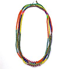 These colorful beaded necklaces are designed to look great as a single strand or mixed together in groups of two, three, four or more! We make these using vintage and new glass beads (with a few lucite pieces added in for a pop of fluorescent color) strung on a waxed poly/cotton cord. About 26" long. Handmade in the USA. Sold individually. Vibrant Beaded Beach Necklaces, Vibrant Beaded Necklace For Beach, Vibrant Beaded Beach Necklace, Vibrant Beach Necklace With Colorful Beads, Colorful Multi-strand Beaded Necklaces, Rainbow Multi-strand Beaded Necklaces, Multi-strand Necklaces With Faceted Beads For Beach, Multicolor Double Strand Beaded Necklace With Large Beads, Multicolor Large Beads Multi-strand Necklace