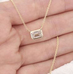 --- Handmade in United States--- Made to Order--- Metal: Solid 14K Gold (White, Rose, Yellow Gold)--- Setting Type: Bezel--- Lab Grown Diamond--- Diamond Shape: Emerald Cut--- Diamond Cut Grade: Excellent--- Diamond Cutting Style: Brilliant Cut--- Diamond Color: E--- Diamond Clarity: VS1--- Diamond Total Carat Weight: 1.0ct ◈ Length: Please inquire if you want it to be an adjustable necklace◈ Ready to Ship in 3- 5 Business days (Please send Convo if you need it sooner before purchasing)◈ Please Everyday Diamond Necklace, Vs1 Diamond, Bezel Necklace, Rose Yellow, Emerald Cut Diamonds, Bezel Diamond, Adjustable Necklace, Diamond Color, Diamond Shape