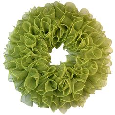 a green wreath with ruffled edges on a white background