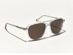 The 1970s, ZULU-inspired aviator, The BJORN, is made from acetate and comes in a translucent color, to fill out your face without covering it up. Full frontal, indeed. Lookin' for an eyeglass? Shop The BJORN. Classic Clear Glass Aviator Sunglasses, Modern Clear Aviator Sunglasses With Polarized Lenses, Modern Polycarbonate Aviator Sunglasses, Modern Clear Aviator Sunglasses With Uva Protection, Downtown Nyc, Everyday Glasses, Full Frontal, Nyc Aesthetic, Zulu