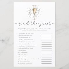 a white card with the words find the guest and a glass of champagne on it