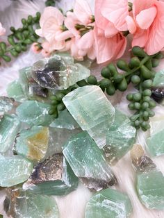 Awesome pieces of raw Green Calcite from Mexico! This green color is super soothing, and will make a great accent piece to your crystal displays, especially if you want a pop of color. Since it is somewhat polished (tumbled rough stones), it can also be carried with you in your purse! The colors are a mix of green, white, browns and some tans. Some pieces of these rough stones will have banding, while others will be more of a solid coloring. Learn more about the powers of green calcite on this p Green Crystals For Healing, Green Natural Stones Crystals For Healing, Green Calcite, Crystal Aesthetic, Calcite Crystal, Crystal Meanings, Raw Crystal, Crystal Cluster, Teal Colors