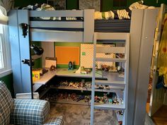 This is a Twin size Workstation Loft Bed with the U-Shaped Desk and Angled Front Ladder. The bed was customized with 12" deep U-Shaped shelves underneath the desk.

From the customer: "So many Lego creations the shelves work great to display them all. My son's room is very small but I think this picture shows enough of the bed and shelf space, we love it. Thanks Amy." Loft Bed Lego Area, Lego Loft Bed, Lego Table Under Loft Bed, Storage Under Loft Bed, Under Loft Bed Ideas For Boys, Loft Bed Ideas For Small Rooms Boys, Bambu House, Under Loft Bed Ideas, Boys Room Bunk Beds