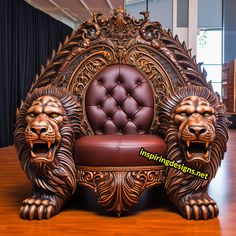 a chair made to look like two lions sitting on top of a wooden table with a black curtain behind it