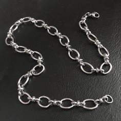 This 10mm thick oval link stainless steel necklace chain is the perfect combination of chic sophistication and rebellious spirit. Made from 316L stainless steel, this shiny silver chain has a timeless appeal that can withstand ever-changing styles and the toughest of elements. It's waterproof and won't tarnish, so feel free to wear it in the shower or bath without worrying about rust or discoloration. Choose from 14 to 20 inches in length, and if you want even more versatility, add our 2 inch ex Silver Stainless Steel Oval Link Chain Necklace, Classic Stainless Steel Oval Link Chain Necklace, Stainless Steel Necklaces With Oval Rolo Chain, Silver Chunky Chain Oval Necklace, Stainless Steel Cable Chain Necklace With Oval Links, Stainless Steel Oval Link Cable Chain Necklace, Chunky Chain Stainless Steel Necklace With Oval Links, Stainless Steel Chunky Chain Necklace With Oval Links, Silver Stainless Steel Chain Necklace With Rolo Chain