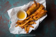 fried fish and french fries with dipping sauce