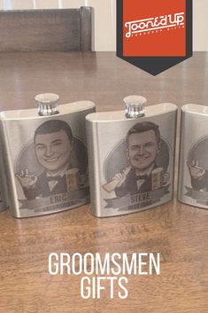 four groomsmen flasks on a table with the words groomsmen gifts