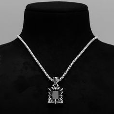 Unleash your inner darkness with the Midnight Claw Pendant Necklace. This striking piece features a bold, black emerald cut stone, securely cradled by a sleek silver claw making it a perfect fit for gothic and alternative aesthetics. Crafted from durable stainless steel, the pendant hangs elegantly from a silver box chain, available in three sizes with an optional 4 inch adjuster chain. Each necklace arrives in a velvet pouch, adding a touch of mystery and allure to your everyday look. Whether y Layering Earrings, Inner Darkness, O Ring Choker, Gothic Bracelet, Gothic Pendant, Word Necklace, Gothic Chokers, Gothic Earrings, Bracelet Box