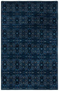 a blue rug with an intricate design on the top and bottom, it is made from wool