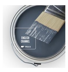 a paint can with a brush in it and the words english channel written on it