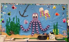 a bulletin board with an octopus and jellyfish on it