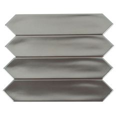 three silver metal tiles on a white background