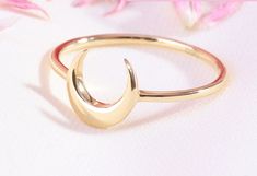 "14K Solid Gold Moon Ring, Cressent Moon Ring, Tiny Moon Ring, Stacking Ring, Half Moon Minimalist Ring, Handmade Jewelry, Graduation Gifts 𝐓𝐡𝐞 𝐩𝐫𝐨𝐝𝐮𝐜𝐭 𝐢𝐧 𝐭𝐡𝐞 𝐢𝐦𝐚𝐠𝐞 𝐢𝐬 𝟏𝟒𝐤 𝐠𝐨𝐥𝐝, 𝐰𝐞 𝐡𝐚𝐯𝐞 𝟏𝟎𝐤 𝐨𝐩𝐭𝐢𝐨𝐧𝐬. Please carefully choose your ring size from the options menu during checkout! These items in our shop are handcrafted and made to order. Jewelry Details Band:14K Solid Gold Carat:585 There are 585 stamps in our rings. We are making Free Custom Engraving. P Gold Moon Shaped Midi Rings As Gift, Gold Moon-shaped Midi Rings As Gift, Gold Moon Midi Rings As A Gift, Minimalist Crescent Ring As Gift, Minimalist Crescent Ring For Gift, Minimalist Crescent Ring Gift, Minimalist Crescent Midi Rings For Gift, Minimalist Crescent Midi Rings As Gift, Moon Minimalist