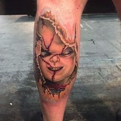 a man's leg with a scary face on it