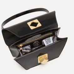 The Arcadia Trapeze combines geometric lines and an oversized front turn lock to create a contemporary style yet chic. A desing that stands out and matches perfectly with evening outfits. Italian Leather Handbags, Evening Outfits, Geometric Lines, Small Shoulder Bag, Leather Working, Italian Leather, Real Leather, Calf Leather, Contemporary Style