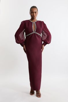 Experience Elevated Occasion Wear In A Plus Size Occasion Dress, Featuring A Fit That Skims The Curves, And Sheer, Chiffon Sleeves With A Balloon Cut For A Playful Edge. The Embellished Trims Make This Piece Perfect For Parties, So Pair It With Strappy Heels For A Look That Takes You To All Upcoming Invites. Plus Size Embellished And Chiffon Sleeve Figure Form Knit Midaxi Dress Statement, Floating Chiffon Sleeves High Neckline Embellished Trim Detailing Figure Hugging Bodice Straight Hanging Ski Petite Work Outfits, Petite Wedding Guest Dresses, Plus Size Workwear, Chiffon Sleeves, Tall Dresses, Outfits Petite, Midaxi Dress, Petite Coat, Plus Size Coats