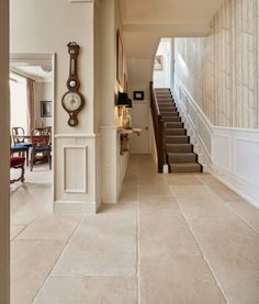 the hallway is clean and ready for us to use as an entrance way in this house