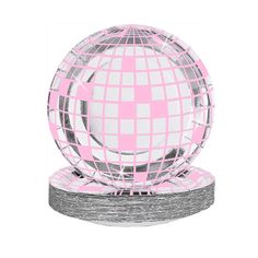 a pink and silver disco ball on top of two stacks of paper towels in front of a white background