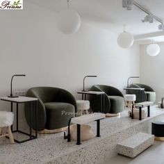 a room with several chairs and stools on the floor in front of a window