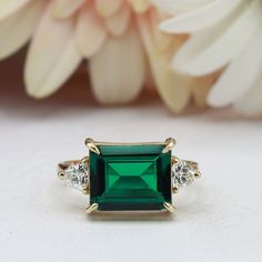 You deserve to own this beautiful gemstone ring. Made by hand to your size and choice of finish. ✦ Gemstone Type - Lab grown Emerald ✦ Gemstone Cut - Octagon facet, trillion cut ✦ Gemstone Size - 10x8mm, 4mm ✦ Total Number of Gemstones - 3 ✦ Finish - 14k Gold Filled (Tarnish Resistant And Nickel Free) - also available in 925 sterling silver * For rings over size 11 please contact us for special pricing. * Custom made designs questions are welcome! ♢ Important information ✦ We are available for q Gift Emerald Ring With Three Stones In Radiant Cut, Rectangular Emerald Ring With Accent Stones For Formal Occasions, Rectangular Emerald Ring With Accent Stones For Formal Events, Rectangular Sterling Silver Emerald Ring For Wedding, Rectangular Emerald Ring In Sterling Silver For Wedding, Classic Rectangular Emerald Gemstone Ring, Rectangular Emerald Ring As A Gift, Square Cut Emerald Ring With Accent Stones, Anniversary Emerald Ring With Rectangular Stone