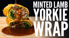 an image of a stuffed food item with the words minied lamb yorkie wrap