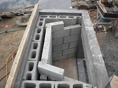 an unfinished concrete slab is being built on the ground