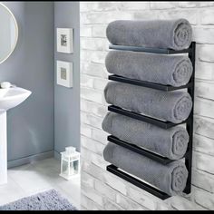 Wall-mounted black towel rack with five tiers Bathroom Towel Storage, Wall Mounted Towel Holder, Modern Towels, Wall Mounted Towel Rack, Towel Holder Bathroom, Regal Design, Steel Bathroom, Towel Rack Bathroom, Towel Storage