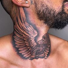 a man with an eagle tattoo on his neck and behind the ear is a bird