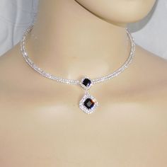 Main Stone: Rhinestone / Crystal Color: Black Onyx Main Color: Silver Necklace Measures Approx: 15" Pendant Drop: 1.1/2" Earrings: 1"L Pierced With Bullet Disc Backs Brand New In Original Package You Will Receive This Item Even More Beautiful Than The Pictures! :) Cubic Zirconia Dangle Rhinestone Necklace For Party, Dangle Rhinestone Necklace For Party, Party Rhinestone Dangle Necklace With Cubic Zirconia, Party Dangle Rhinestone Necklace With Cubic Zirconia, Crystal Rhinestone Dangle Necklace, Party Dangle Rhinestone Necklace, Crystal Dangle Jewelry With Stones, Crystal Pendant Jewelry With Rhinestones, Crystal Pendant Jewelry For Evening