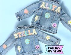 two children's denim jackets with patches on them and the words stella written in large letters