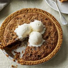 a pie with three scoops of ice cream on top