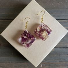 Beautiful Handmade Resin Earrings With Square Resin Pendants Filled With Real Dried Rose Petals, And Vibrant Yellow Wildflower. Natural Flower Earrings, Comfortably Lightweight, And Filled With Natural Beauty Preserved For Eternal Elegance Rose Petal Resin Keychain, Pink Flower Crystal Earrings For Gift, Uv Resin Flower Jewelry, Pink Flower Earrings Gift For Her, Pink Birth Flower Earrings For Wedding, Pink Drop Earrings With Pressed Flowers, Pink Pressed Flower Drop Earrings, Pink Drop Flower Earrings As Gift For Her, Pink Drop Flower Earrings For Her