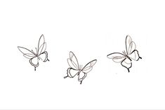 three small butterflies flying in the air with one being drawn on it's back