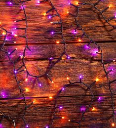 purple and orange lights are on the wood