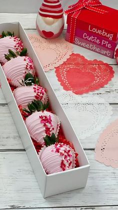 valentine's chocolate covered strawberries in a white box with red and pink decorations