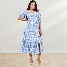 "Indulge in timeless beauty each day with our enchanting block print dress, delicately fashioned from the finest 100% cotton voile with a cotton mulmul lining. Revel in its ethereal drape, perfect for any occasion, whether it's a leisurely stroll, a charming lunch date, or a whimsical dinner date.  Care: Hand wash separately in cold water with mild detergent. Gentle Cycle Machine Wash. Do not soak. Dry in shade. Garment Size Chart in Inches:- Size XS - Bust - 34\" Size S - Bust - 36\" Size M - Bust - 38\" Size L - Bust - 40\" Size XL - Bust - 42\" Size XXL - Bust - 44\" Made in India DISCLAIMER: In the artful process of hand block-printing, variations are likely to come into existence. These irregularities are the trademark of all handmade products and will give you a remarkable and unique Floral Print Cotton Voile Dresses, White Cotton Voile Dress With Block Print, White Block Print Dress In Cotton Voile, Festive Ankle-length Block Print Dresses, Blue Block Print Cotton Midi Dress, White Block Print Cotton Voile Dress, Blue Block Print Vacation Dress, Cotton Block Print Maxi Dress With V-neck, Blue Block Print V-neck Dress