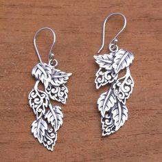 Leaf-Themed Sterling Silver Dangle Earrings from Bali - Fantastic Forest | NOVICA Forest Leaves, Silver Dangle Earrings, Silver Work, Sterling Silver Dangle Earrings, Sterling Silver Hoop Earrings, Sterling Silver Hoops, Balinese, Contemporary Jewelry, Silver Earrings Dangle