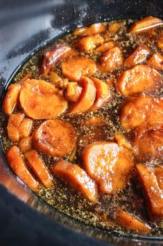 the food is being cooked in the slow cooker