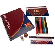 a set of school supplies including pencils, ruler and notebook with barcelona flag on it