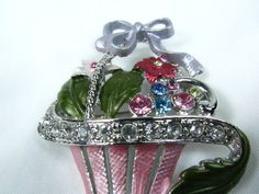 "Beautiful vintage brooch . I bought this pin from an older lady who said she had it since the 1950-60s. Set in silver tone metal are beautiful flower petals with colored rhinestones ,enamel. perfect condition.beautiful pastel color. Size is 2.5\" wide x 2.5\" tall." Pink Rhinestone Brooches For Gifts, Pink Rhinestone Brooches As Gift, Vintage Pink Enamel Brooch Pin, Vintage Pink Enamel Pin Brooch, Pink Costume Jewelry Brooch For Gift, Pink Costume Jewelry Brooches For Gifts, Pink Flower Enamel Pin, Vintage Pink Enamel Pin Gift, Vintage Pink Enamel Pin