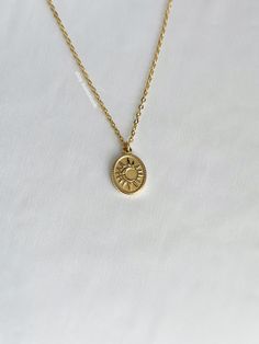 A golden celestial style necklace that's so stunning on and matches everything. An absolute essential in every jewelry collection. Our chains are 100% stainless steel and hypoallergenic so they won't rust, tarnish, or turn your neck green. - Water resistant - Lobster clasp closure - Stainless steel pendant + chain - Select desired size at checkout Minimalist Gold Charm Necklace With Sun And Moon Design, Gold Dainty Sun Design Charm Necklace, Minimalist Gold Necklace With Sun And Moon Design, Minimalist Gold Necklace With Sun Design, Dainty Gold Charm Necklace With Sun Design, Trendy Gold Jewelry With Sun Design, Sun Moon Necklace, Sun And Moon Necklace, Gold Moon Necklace