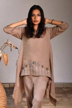 Shop for Linen Bloom Beige Linen Embroidered Tunic for Women Online at Aza Fashions Summer Embroidered Linen Tunic, Spring Linen Kurta With Chikankari Embroidery, Spring Linen Tunic Kurta, Spring Linen Kurta With Resham Embroidery, Spring Linen Tunic With Embroidery, Spring Linen Kurta With Floral Embroidery, Spring Linen Straight Kurta Set, Summer Linen Kurta With Resham Embroidery, Spring Linen Fitted Kurta