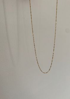 14k yellow gold 1.5mm chain. Choice of chain length: 16" or 18". Made here in New York from recycled materials. This product is currently in stock; please allow 3-5 business days for shipping. For more information about this product, or if you need it sooner, email us. Details here on how to care for this piece. 14k Gold Delicate Link Chain Necklace, Delicate 14k Gold Link Chain Necklace, Everyday Delicate Chain Necklace In Recycled Gold, Minimalist 14k Gold Delicate Chain Necklace, Minimalist Yellow Gold Figaro Chain Necklace, Dainty Yellow Gold Chain Necklace With Rectangular Links, Dainty 14k Gold Necklace With Rectangular Links, Delicate Yellow Gold Chain Necklace 14k Gold Filled, Minimalist Recycled Gold Delicate Chain Necklace