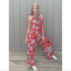 Truth + Wisdom Ruffle V-Neck Flowered Red Jumpsuit Chic Red Floral Print Jumpsuit, Casual Red V-neck Jumpsuits And Rompers, Casual Red V-neck Jumpsuit, Chic Red Jumpsuits And Rompers For Summer, Red Fitted Jumpsuits And Rompers For Vacation, Fitted Red Jumpsuits And Rompers For Vacation, Red Fitted Jumpsuit For Vacation, Casual Red Overall Jumpsuits And Rompers, Red Floral Print Jumpsuit With V-neck